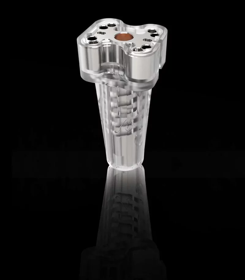 Crazy Volcano Goliath Heating Block: Silver and clear 3D-printed heating block with multiple ports for 3D printer use.