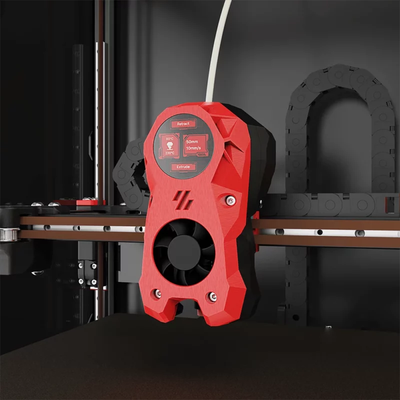 BigTreeTech KNOMI for Voron Stealthburner: Red and black 3D printer extruder with display and fan, mounted on rail.