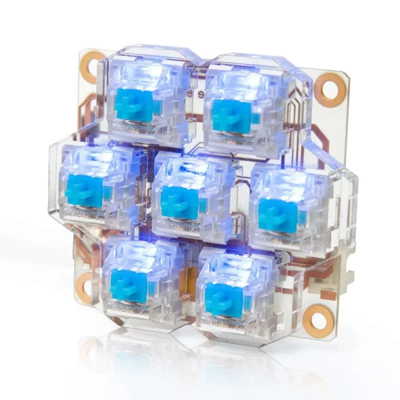 BigTreeTech HBB/HBB Fe: Mechanical keyboard switches with blue keycaps, LED illumination on a clear PCB