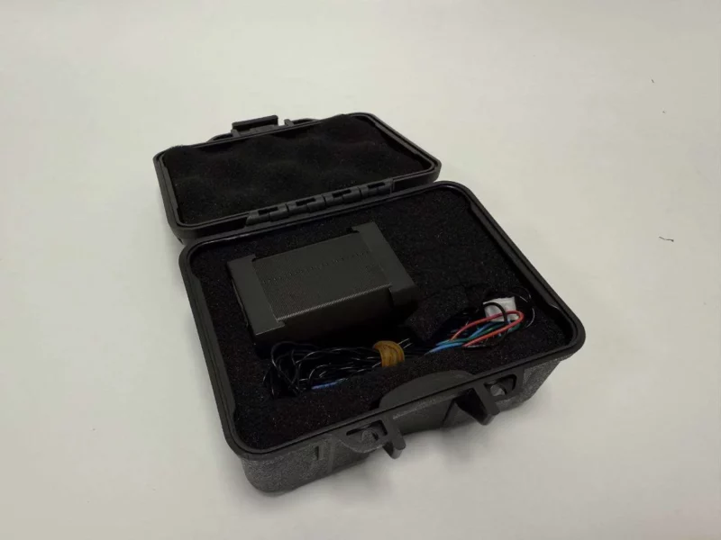 Kraken Motors stepper motor by Devil Design, inside a black protective case with foam padding and wires