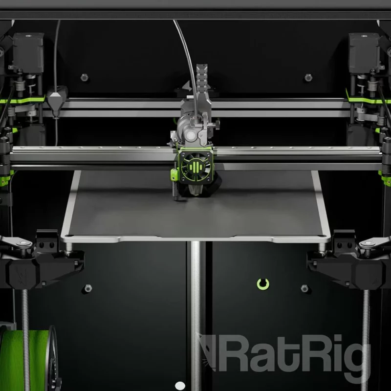 RatRig V-Core 4 - 300 3D printer. Black frame with green accents, heated bed, and print head.