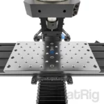 Rat Rig Mill: Close-up of a metal work surface with multiple mounting holes, part of the Rat Rig Mill CNC machine.