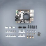 ToqueCAN board with connectors, accessories, and various electronic components.