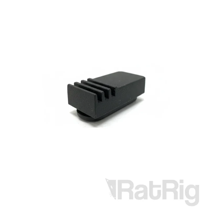 Rat Rig V-Core 4.0 Oozeguard: Black 3D printer part with grooved design.