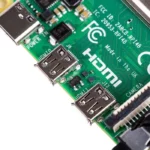 Raspberry Pi 4 Model B 4GB: Close-up of HDMI ports, power input, and FCC ID on the board.