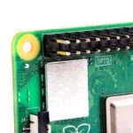 Raspberry Pi 4 Model B 4GB: Close-up of GPIO pins, heatsink, and board components.