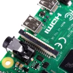 Raspberry Pi 4 Model B 4GB: Close-up showing HDMI ports, camera connector, and board components.