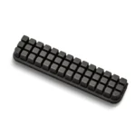 Panda Nozzle Brush for Bambu Lab A1 Printer, black rubber grip with textured cleaning bristles.